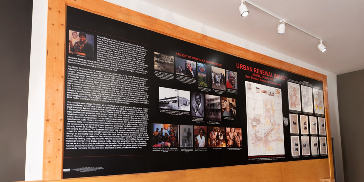 A mural in Asheville, North Carolina, depicts the history of the city's Southside neighborhood and the impact of urban renewal. Students in INFO's Computational Archival Science courses analyze archival records on that history.